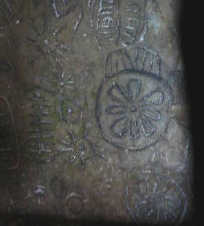 Sun symbols in Cairn-T, Loughcrew Ireland